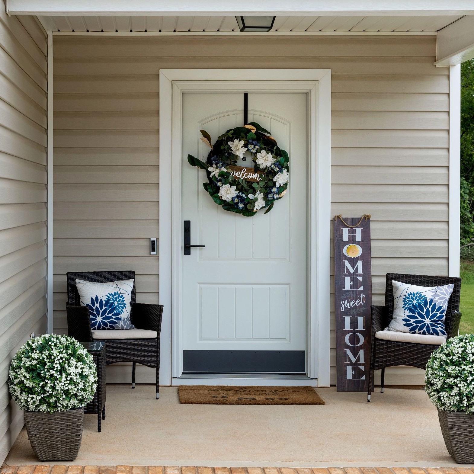 A single panel Ensemble entry door. The door is solid white.