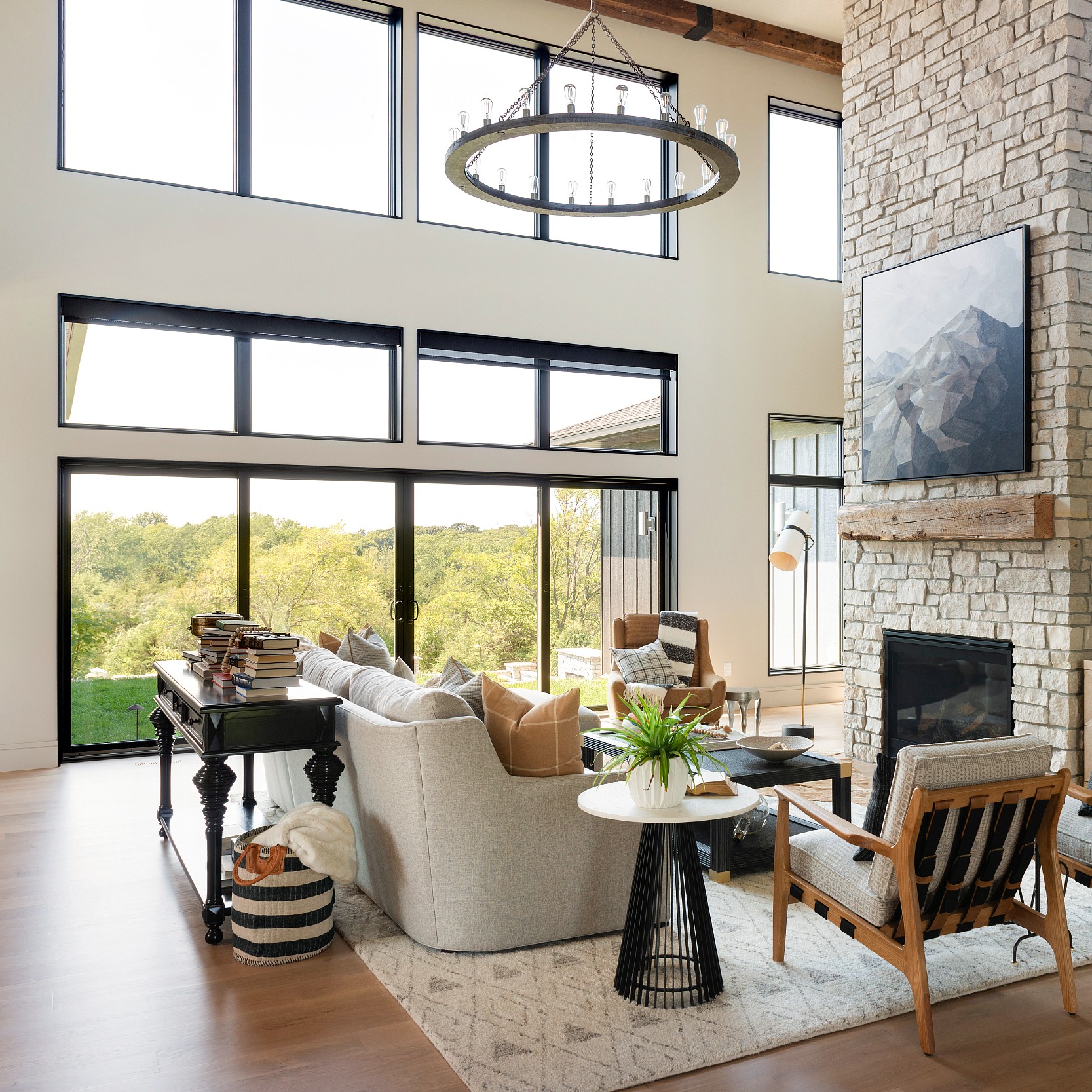 A window wall made up of picture windows and several modern 200 series sliding glass patio doors.