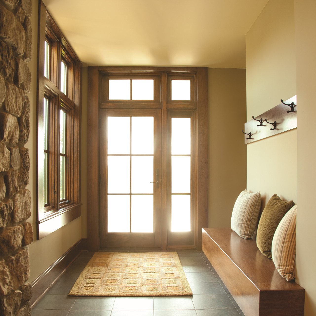Single french door, inswing, with a sidelight and a transom.
